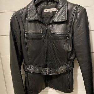 Woman’s gently used black leather jacket